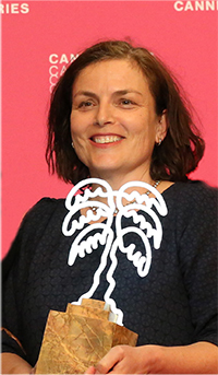 Scriptwriter Mette Bølstad with the prize she won for best script at the new Cannes International Series Festival in April 2018. Lykkeland also won the prize for best music. Bølstad already has material for several more seasons.