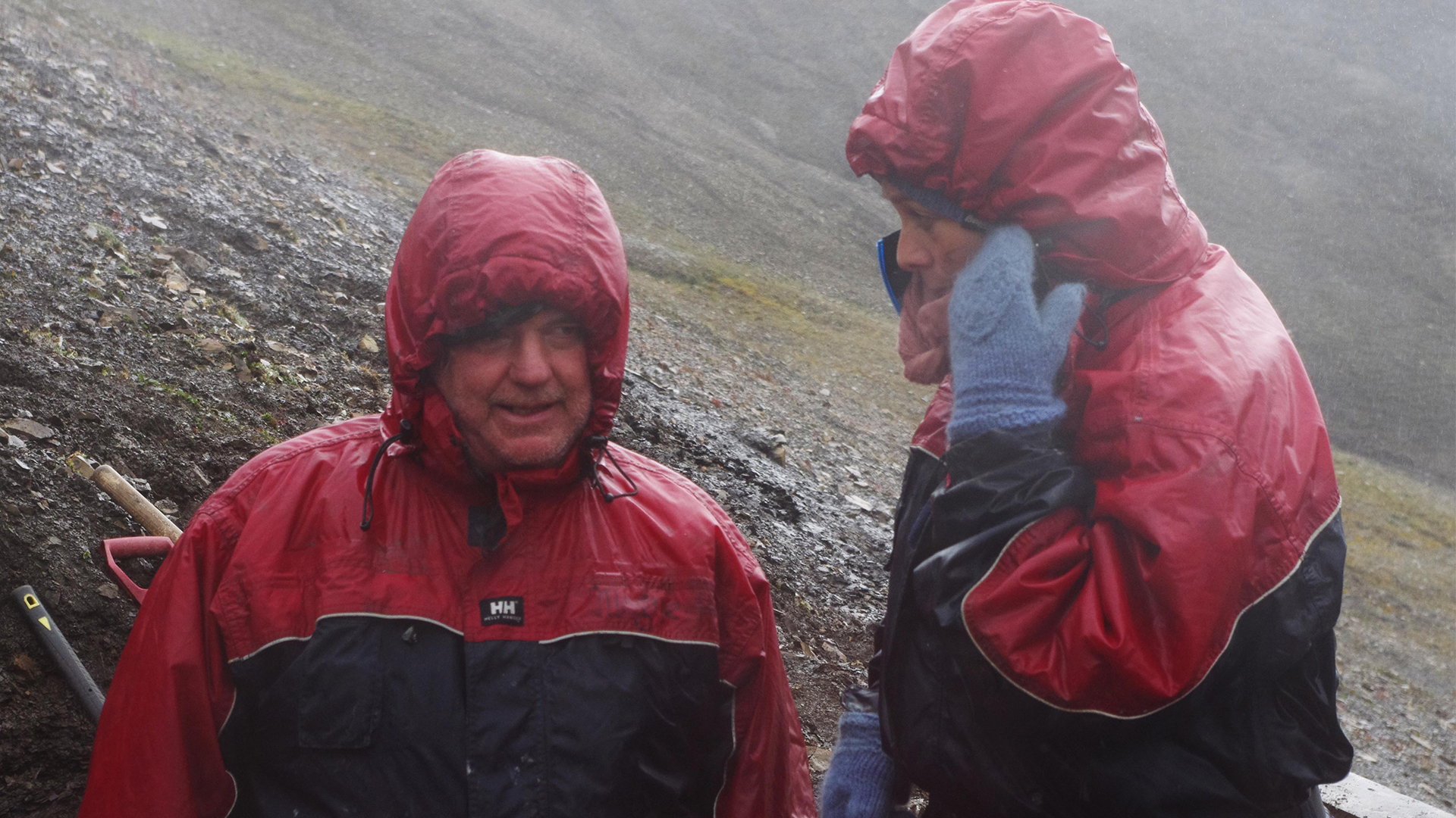 Picture of two people out in the terrain.