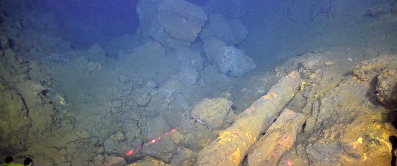 Photo of inactive sulphide accumulations with collapsed vents.